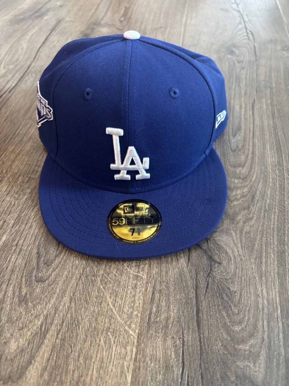 New Era Blue Fitted Baseball Cap with White Logo